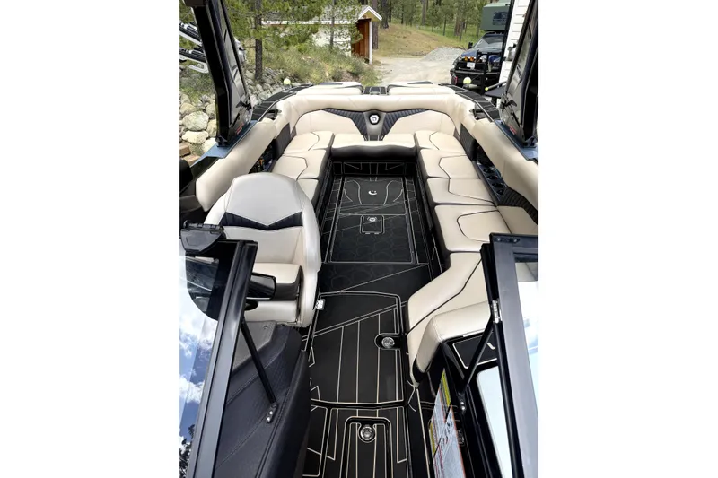 Slide: The Image of 2023 Centurion Fi25 boat interior with luxurious seating and modern design. - 3