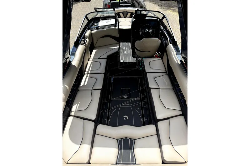 Slide: The Image of 2023 Centurion Fi25 boat interior with luxurious seating and modern design. - 7
