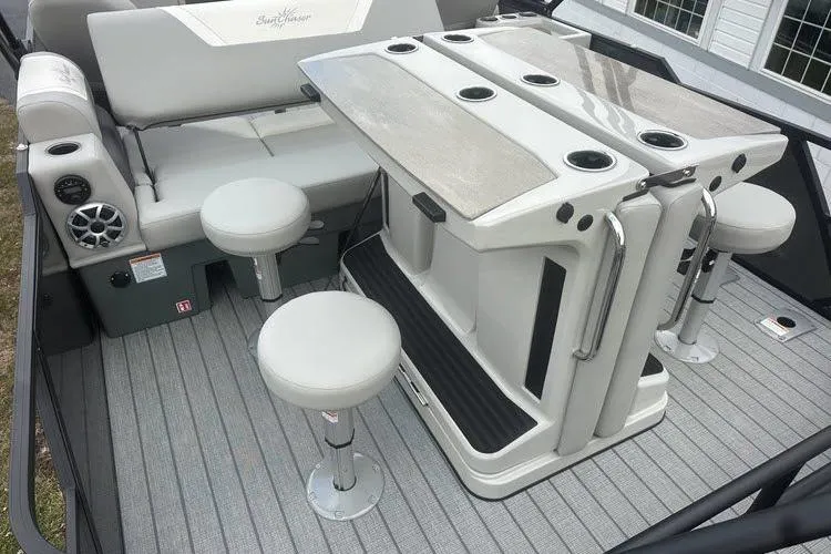 Slide: The Image of 2026 SunChaser Eclipse 25 SBX DH BAR interior with seating and bar setup. - 13