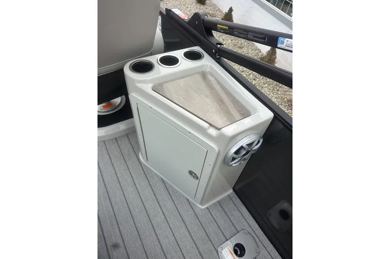 Slide: The Image of Interior of 2026 SunChaser Eclipse 25 SBX DH BAR with cup holders and storage compartment. - 15