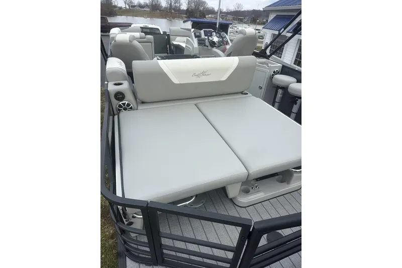 Slide: The Image of 2026 SunChaser Eclipse 25 SBX DH BAR pontoon boat with spacious seating and modern design. - 8