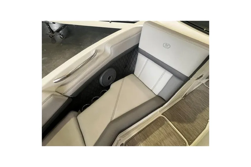 Slide: The Image of 2024 Cobalt R4 boat interior with cushioned seating and sleek design. - 12