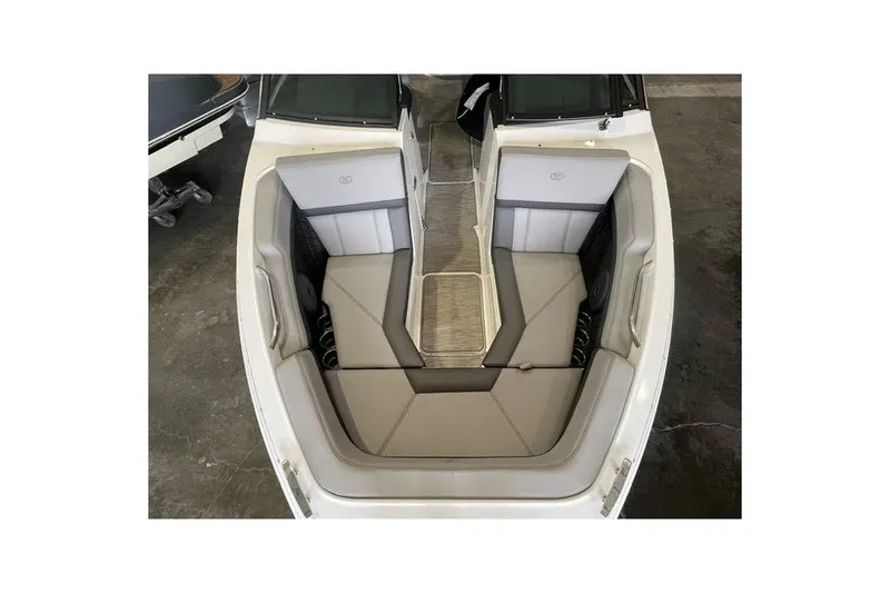 Slide: The Image of 2024 Cobalt R4 boat interior with gray seating and sleek design. - 13