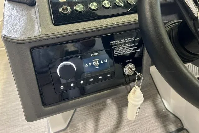 Slide: The Image of 2024 Cobalt R4 dashboard featuring Fusion Apollo audio system and ignition key. - 27