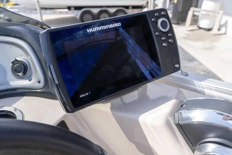 Slide: The Image of Humminbird Helix 7 fish finder on 2019 Sun Tracker Fishin' Barge 22 DLX dashboard. - 11