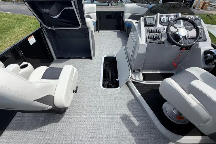 Slide: The Image of Interior of 2026 SunChaser Geneva Sport 23 LR DH boat with modern seating and control panel. - 5
