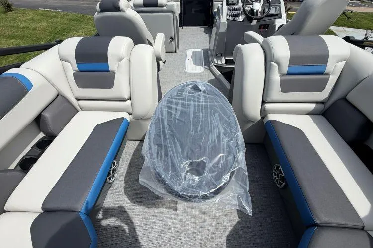 Slide: The Image of Interior of 2026 SunChaser Geneva Sport 23 LR DH pontoon boat with plush seating. - 8