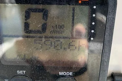 Slide: The Image of Close-up of a digital display on a 2006 Regulator 24 Classic boat. - 33