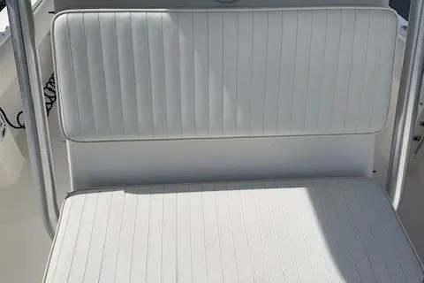 Slide: The Image of White cushioned seating on a 2006 Regulator 24 Classic boat. - 41