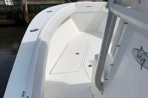 Slide: The Image of 2006 Regulator 24 Classic boat deck, showcasing spacious seating and sleek design. - 43