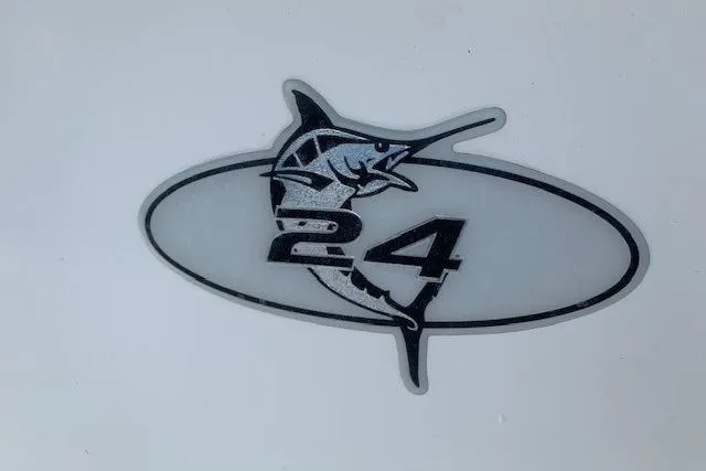 Slide: The Image of Regulator 24 Classic 2006 logo featuring a marlin design on a white background. - 44