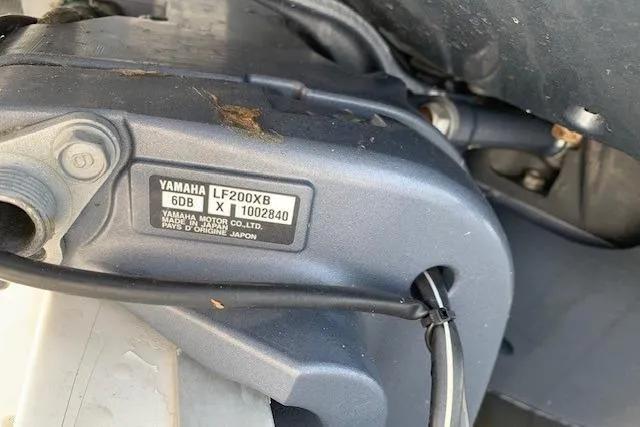 Slide: The Image of Close-up of Yamaha LF200X8 engine part on 2006 Regulator 24 Classic boat. - 49