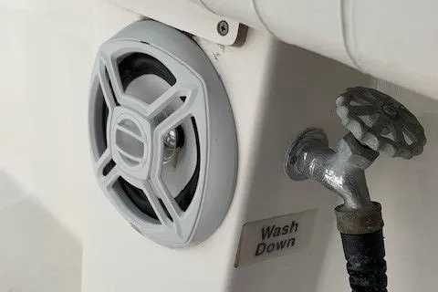 Slide: The Image of 2006 Regulator 24 Classic boat washdown faucet and speaker detail. - 65
