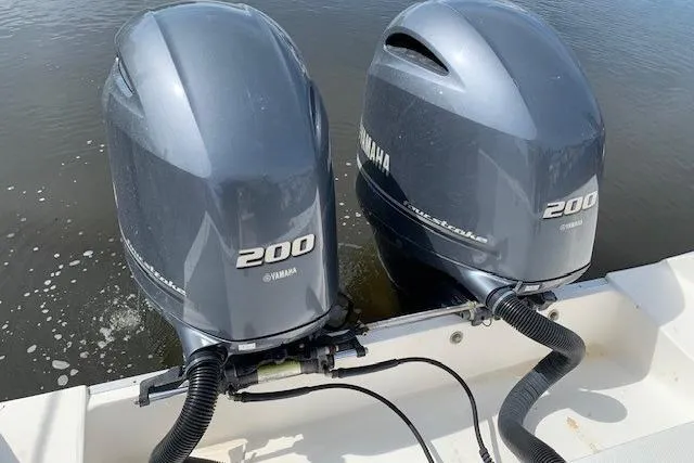 Slide: The Image of Twin Yamaha 200 outboard engines on a 2006 Regulator 24 Classic boat. - 68