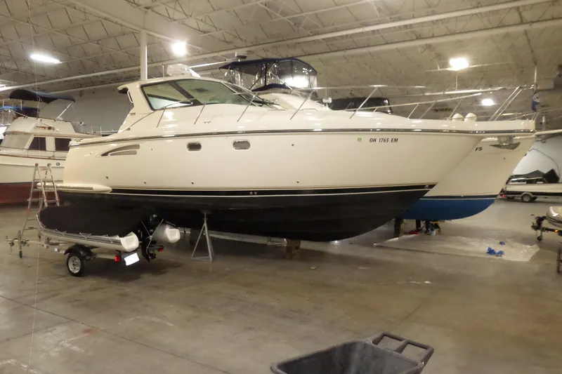 The Image of 2006 Tiara Yachts 3600 Sovran in indoor storage, showcasing sleek design and craftsmanship. - 0