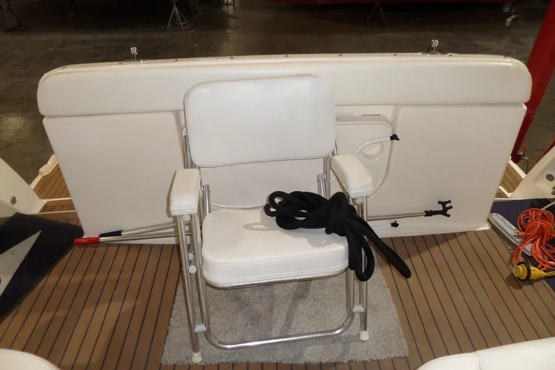 Slide: The Image of White chair on Tiara Yachts 3600 Sovran 2006 deck with nautical accessories. - 10