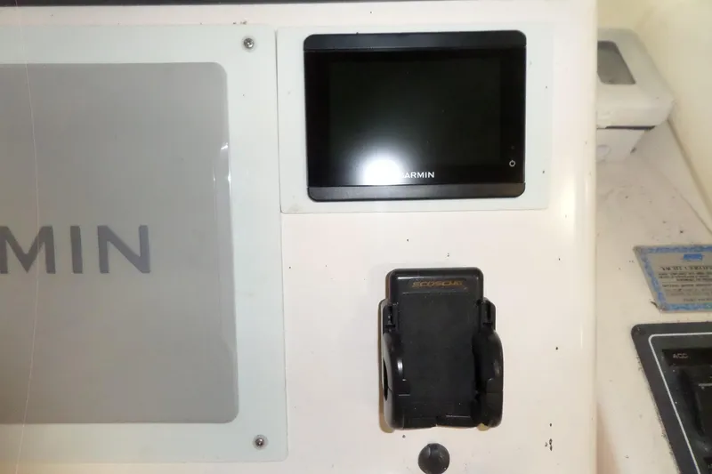 Slide: The Image of Garmin display and mount on 2006 Tiara Yachts 3600 Sovran dashboard. - 20