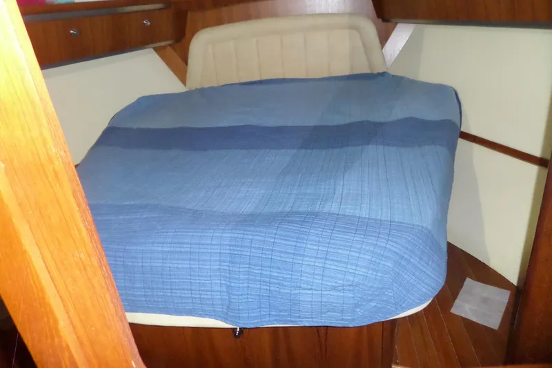 Slide: The Image of Interior cabin of 2006 Tiara Yachts 3600 Sovran with blue bedding. - 27