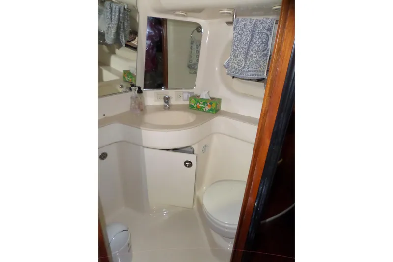 Slide: The Image of Bathroom interior of 2006 Tiara Yachts 3600 Sovran with sink and toilet. - 34
