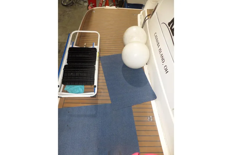 Slide: The Image of 2006 Tiara Yachts 3600 Sovran deck with ladder and fenders, Catawba Island, OH. - 4
