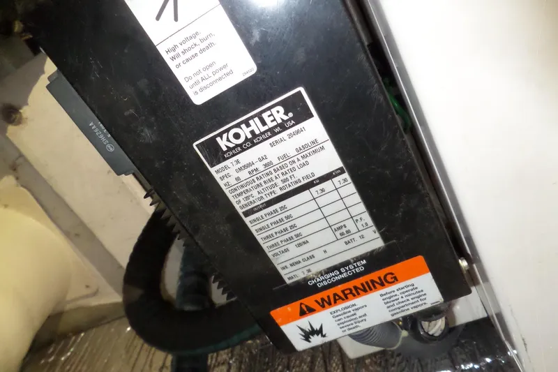 Slide: The Image of Kohler generator label on 2006 Tiara Yachts 3600 Sovran, showing specifications and warning. - 45
