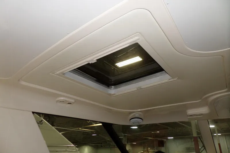 Slide: The Image of Ceiling view of 2006 Tiara Yachts 3600 Sovran with a skylight and lighting fixture. - 53
