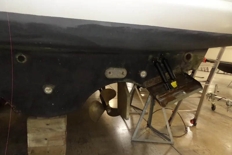 Slide: The Image of 2006 Tiara Yachts 3600 Sovran hull and propeller in maintenance setting. - 60