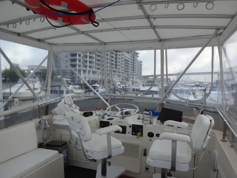 Slide: The Image of Interior view of 1987 Hatteras 43 yacht in harbor. - 34