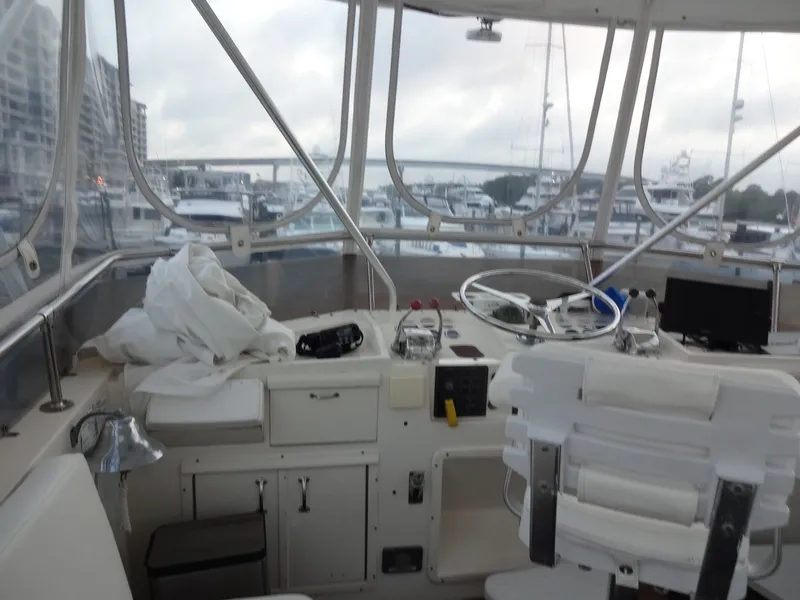 Slide: The Image of Interior view of 1987 Hatteras 43 yacht helm station. - 37