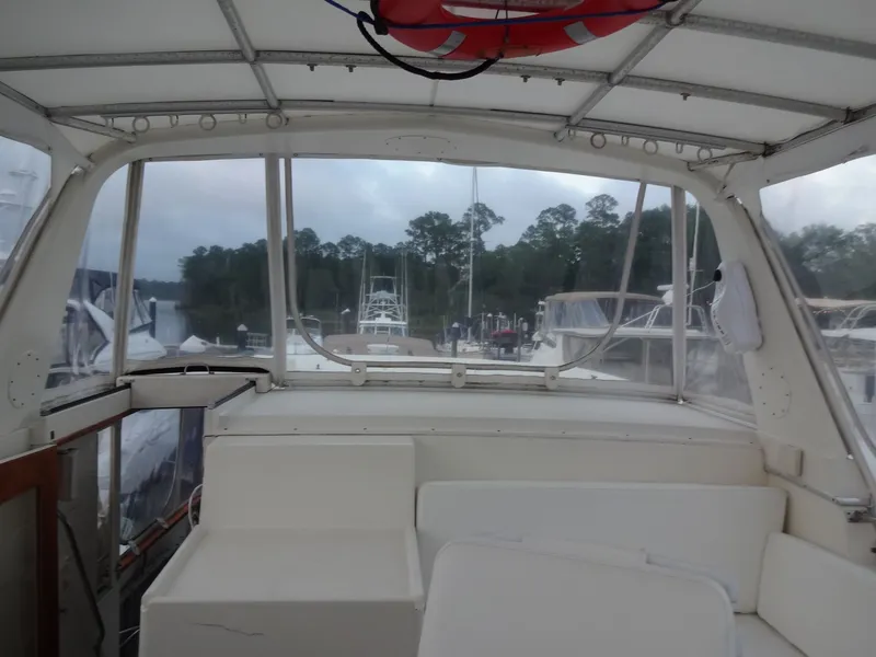Slide: The Image of Interior view of a 1987 Hatteras 43 yacht in harbor. - 39