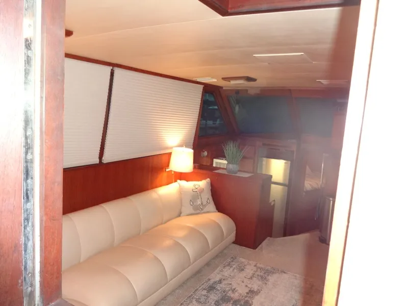 Slide: The Image of Interior of a 1987 Hatteras 43 yacht with sofa and lamp. - 41