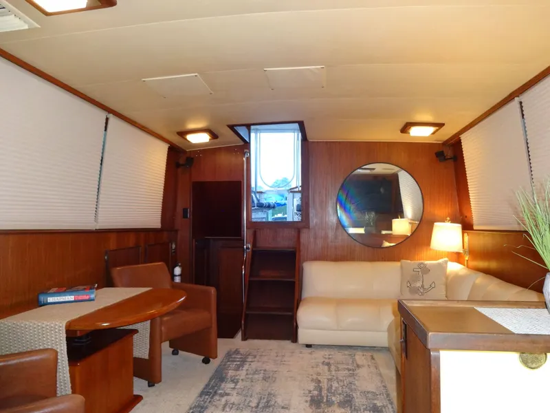 Slide: The Image of Interior of a 1987 Hatteras 43 yacht with cozy furnishings. - 47