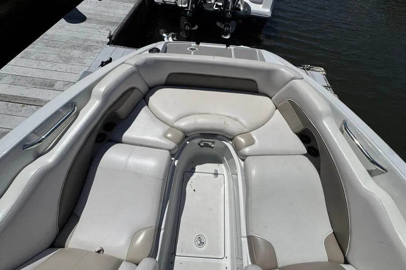 Slide: The Image of 2013 Crownline Eclipse E6 XS boat interior with spacious seating and sleek design. - 20