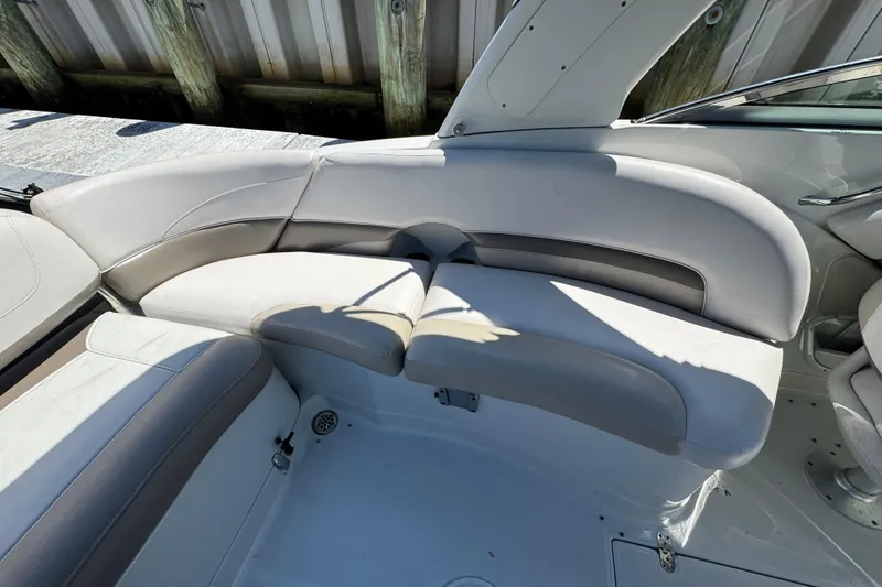 Slide: The Image of 2013 Crownline Eclipse E6 XS boat interior with cushioned seating. - 7