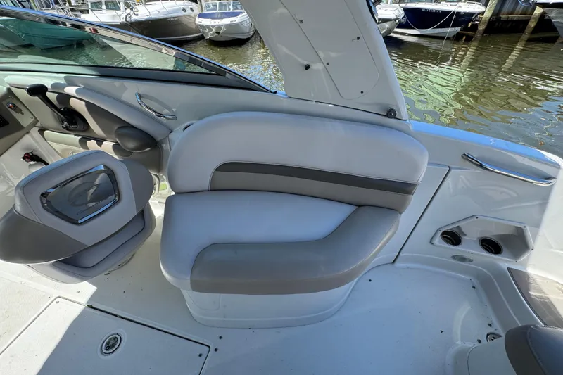 Slide: The Image of Interior of 2013 Crownline Eclipse E6 XS boat with comfortable seating and modern design. - 9