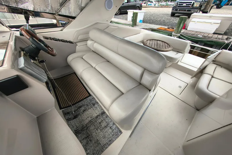 Slide: The Image of Interior of a 2001 Regal Commodore 3260 yacht with leather seating. - 11