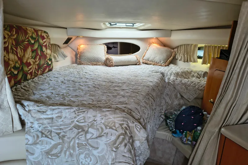Slide: The Image of Interior of a 2001 Regal Commodore 3260 yacht with cozy bed. - 20