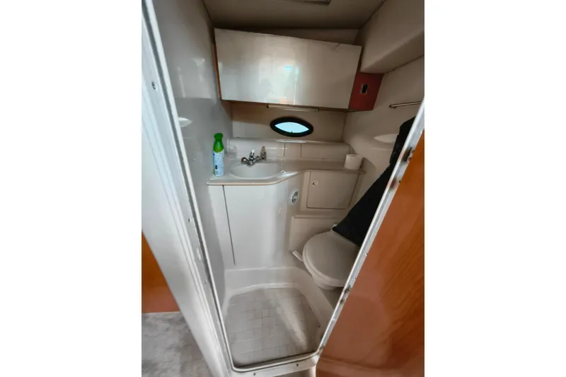 Slide: The Image of Bathroom in 2001 Regal Commodore 3260 boat. - 22