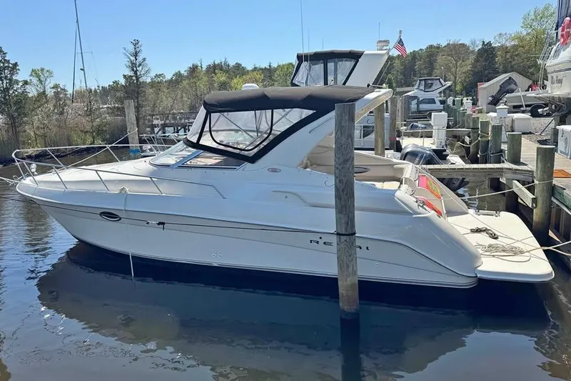 The Image of 2001 Regal Commodore 3260 yacht docked at marina, side view. - 5