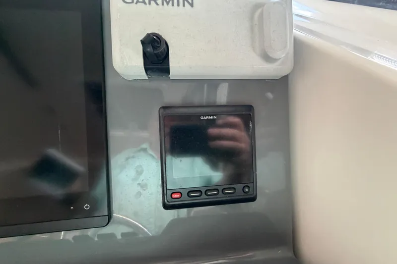 Slide: The Image of Garmin navigation system on 2002 Tiara Yachts 3800 Open dashboard. - 12