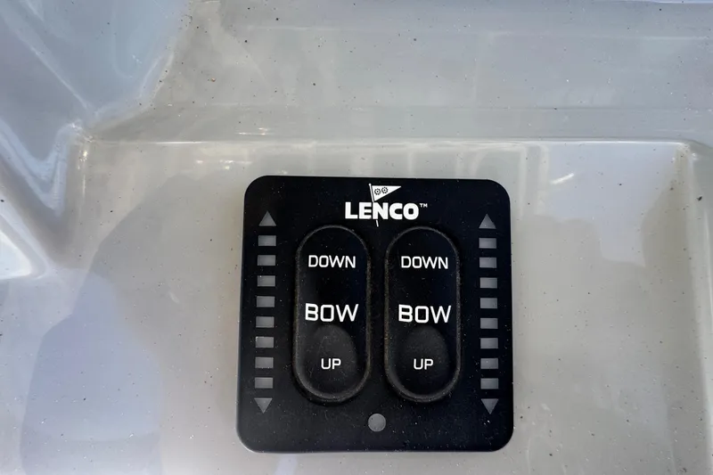 Slide: The Image of Lenco trim tab control panel on 2014 Boston Whaler 210 Dauntless boat. - 22