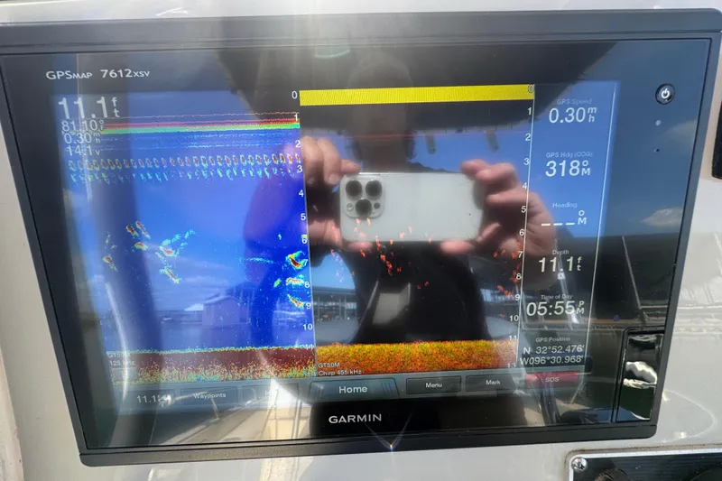 Slide: The Image of Garmin GPS display on 2014 Boston Whaler 210 Dauntless, showing depth and navigation data. - 24