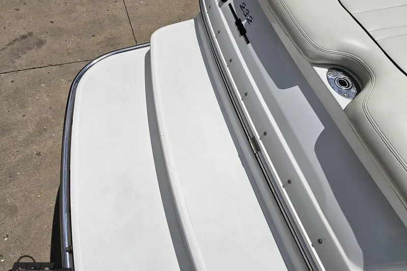 Slide: The Image of 2010 Cobalt 232 WSS boat swim platform and seating detail. - 35