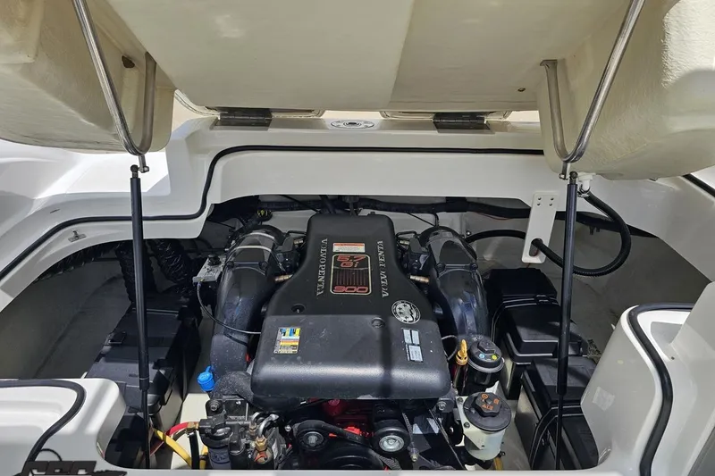 Slide: The Image of Engine compartment of a 2010 Cobalt 232 WSS boat with Volvo Penta engine. - 98
