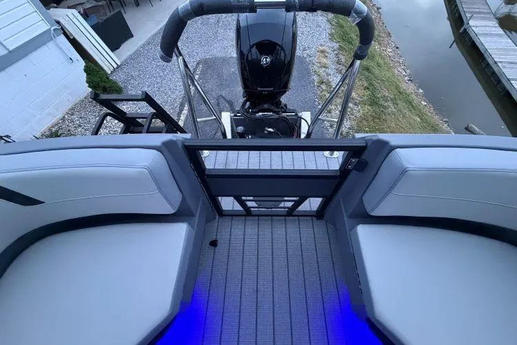 Slide: The Image of 2026 SunChaser Lucerne 22 LR DH Sport boat with modern seating and sleek design. - 5