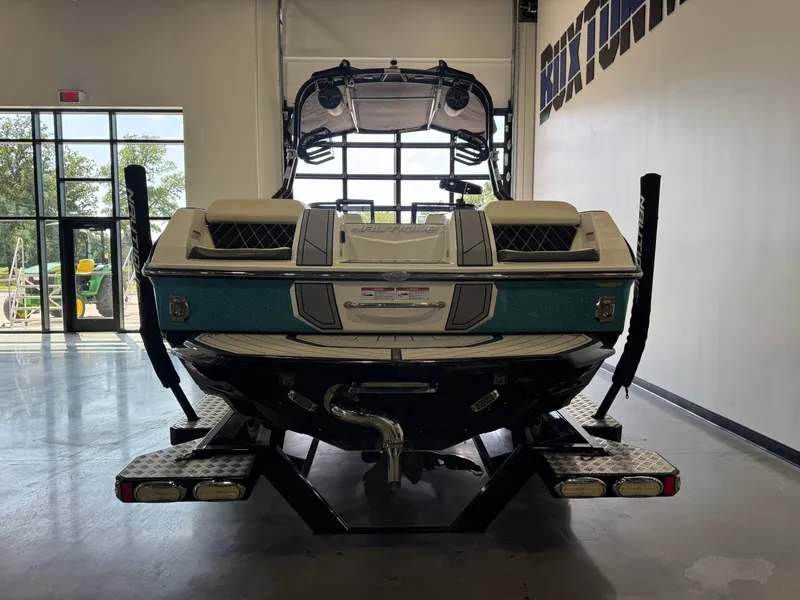 Slide: The Image of 2020 Nautique Super Air Nautique GS24 in a showroom. - 6