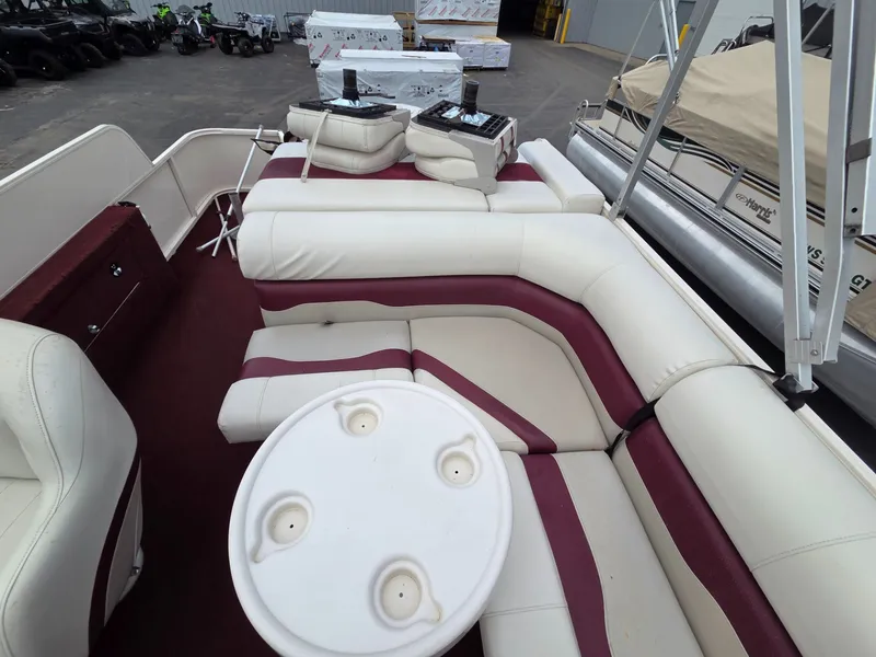 Slide: The Image of Interior of a 2005 Starcraft STR20 pontoon boat with seating area. - 19
