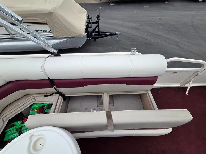 Slide: The Image of Starcraft STR20 pontoon boat seat with storage, year 2005. - 26