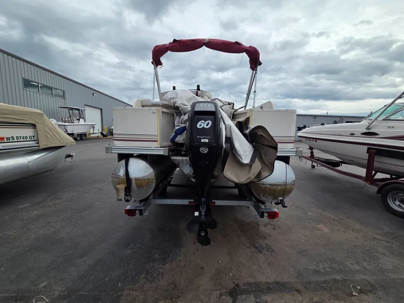 Slide: The Image of Rear view of a 2005 Starcraft STR20 pontoon boat with outboard motor. - 4