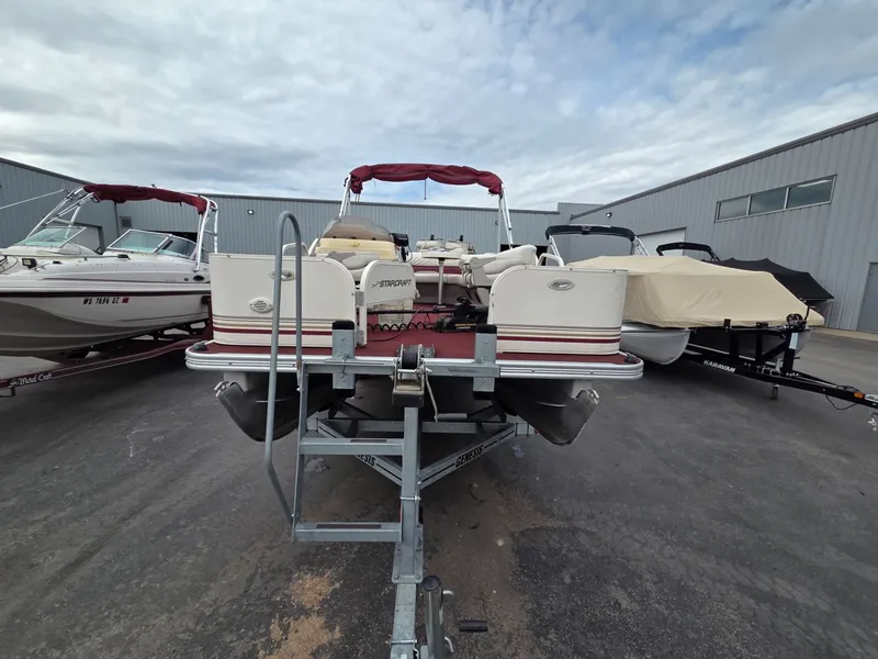 Slide: The Image of 2005 Starcraft STR20 pontoon boat on a trailer. - 7